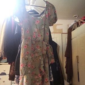 A green dress with pink flowers